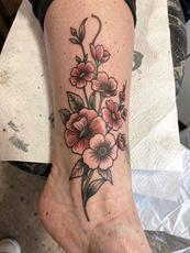 Flowers On Ankle Tattoo