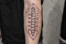 Geometric Spine Tattoo