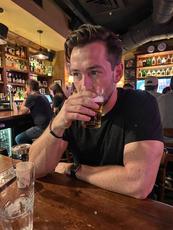 Man Drinking At Bar