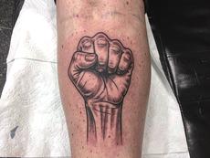 Raised Fist Tattoo