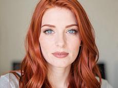 Redhead Woman With Blue Eyes
