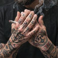 Smoking Tattooed Hands
