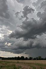 Storm Clouds Over A Field